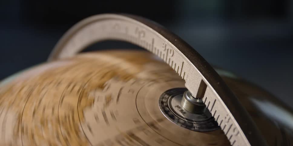 Close up of world globe earth with brown maps spinning around fast