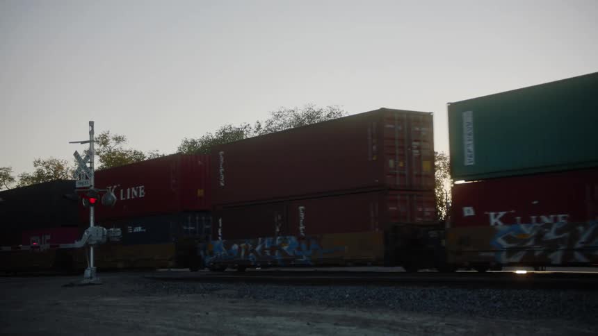 Lights flash as a train drives by