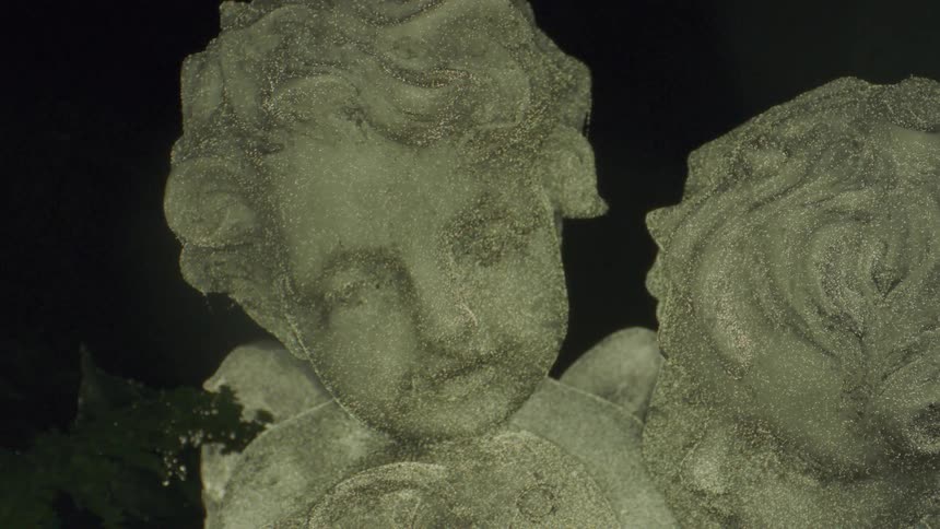 A statue of two cherubs appears scanned and rendered within a three dimensional computer environment