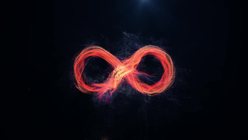 The fire is moving in a figure eight in the dark
