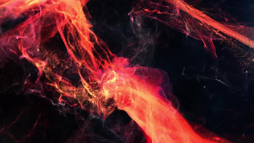 The fire sputters and shoots around