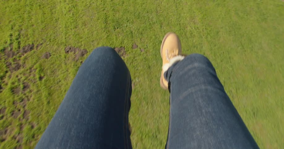 A person moving freely above the grasslands