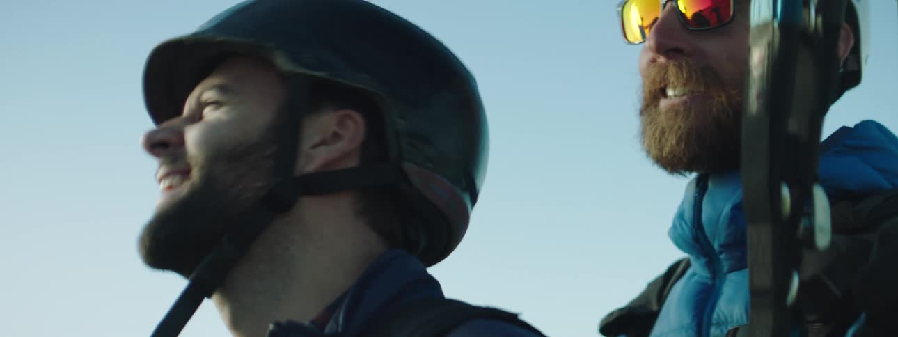 Two men look around in awe