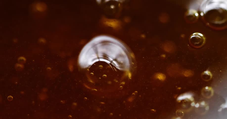 Close up of dripping honey