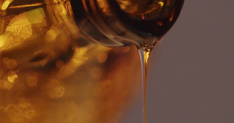 Liquid being poured out of a bottle