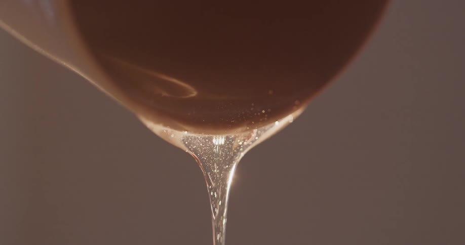 Liquid pouring out of a cup