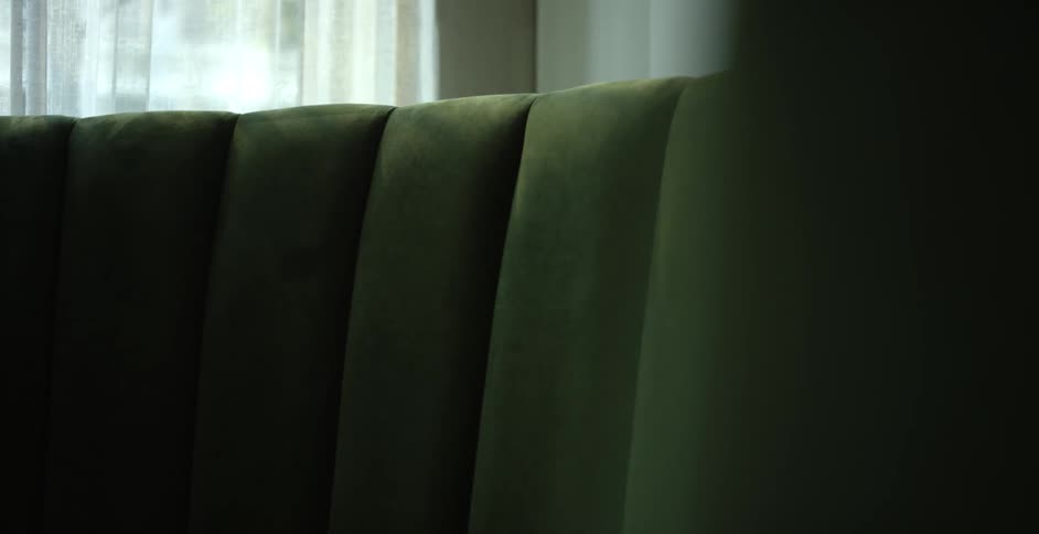 A dark green sofa