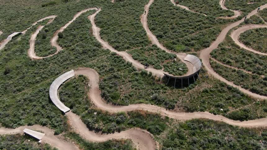 People biking on an outdoor track