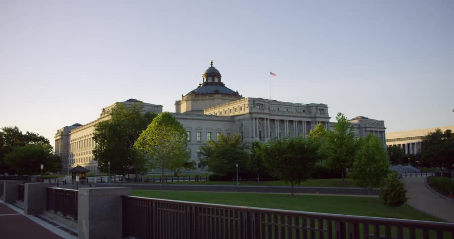 A pedestrian bridge and the Library of Congress in Washington DC