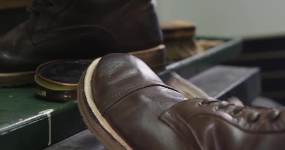 A person shines a shoe
