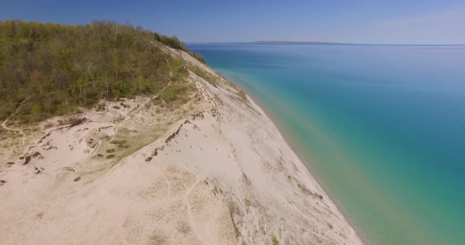 Aerial view of a sandy coast and ocean