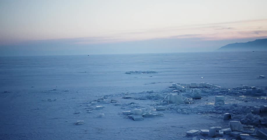 A hovercraft crosses the arctic tundra during the day