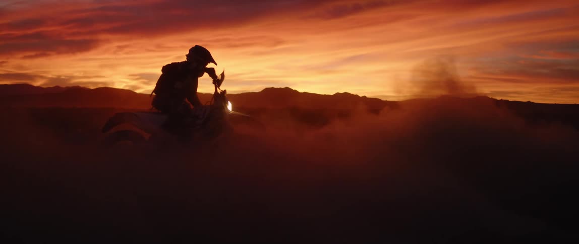 A person spins out on his dirt bike