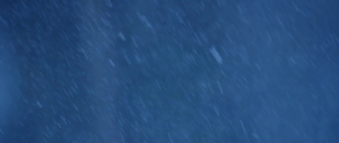 A heavy snow storm blows in at dusk