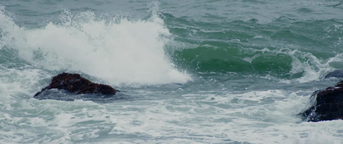 The Atlantic Ocean churns as it crashes along the coastline