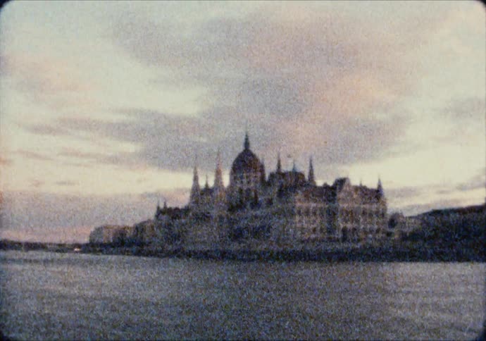 The Hungarian Parliament Building sits along the Danube River at dawn