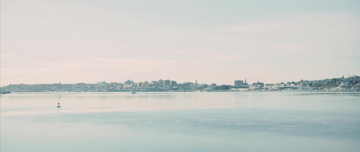 Approaching a coastal city on a cold winter's day