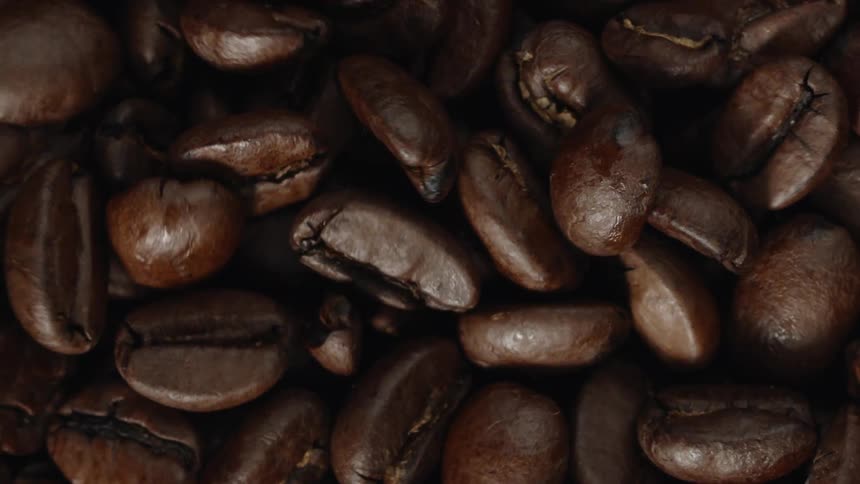 The beans are mixing in the grinder