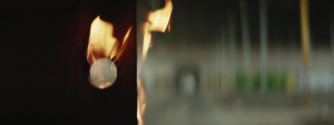 Wooden door burns in empty warehouse