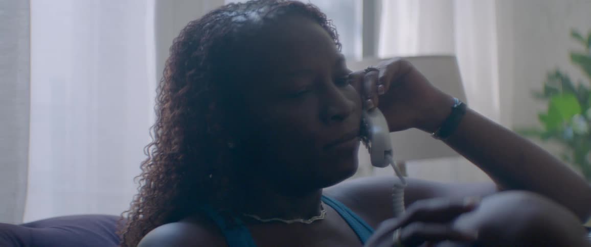 A woman talks on the phone