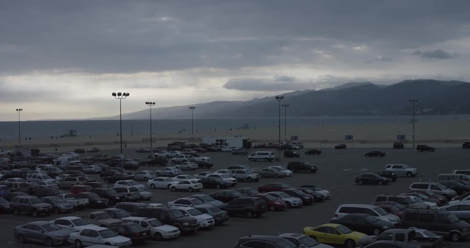 A parking lot full of parked cars