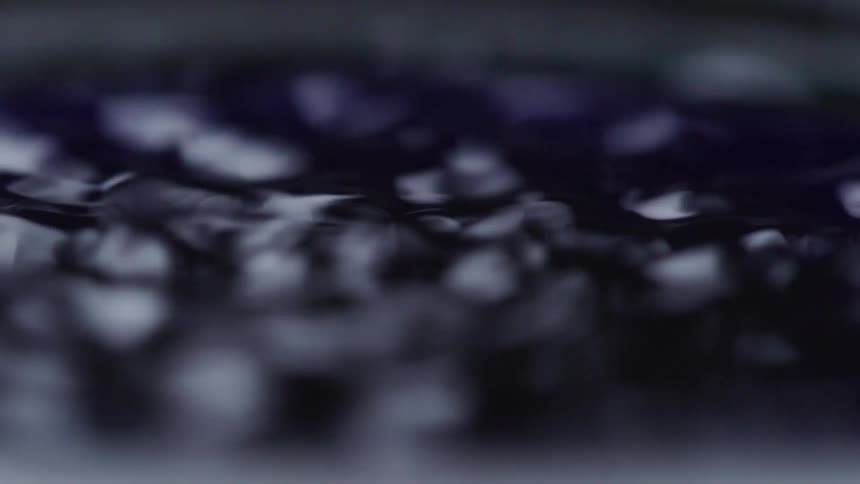 Bubbles forming as a liquid comes to a boil
