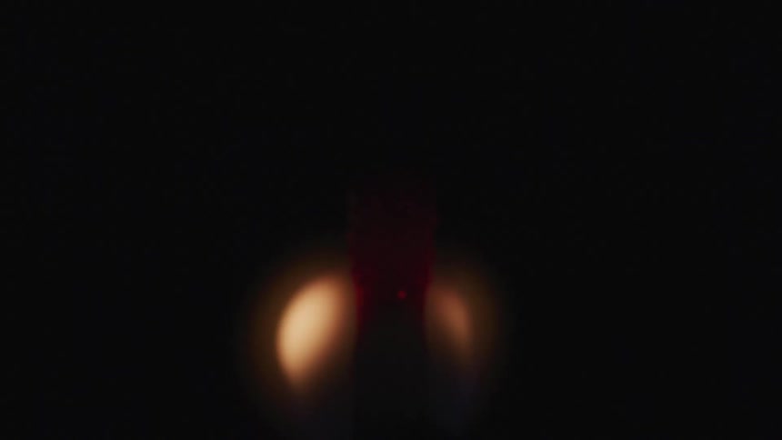 A match slowly burns and flickers