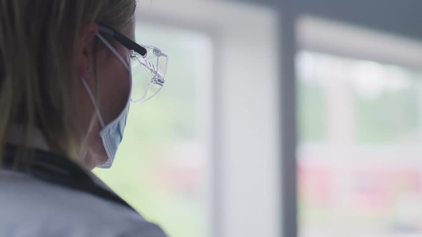 A nurse standing in a clinic