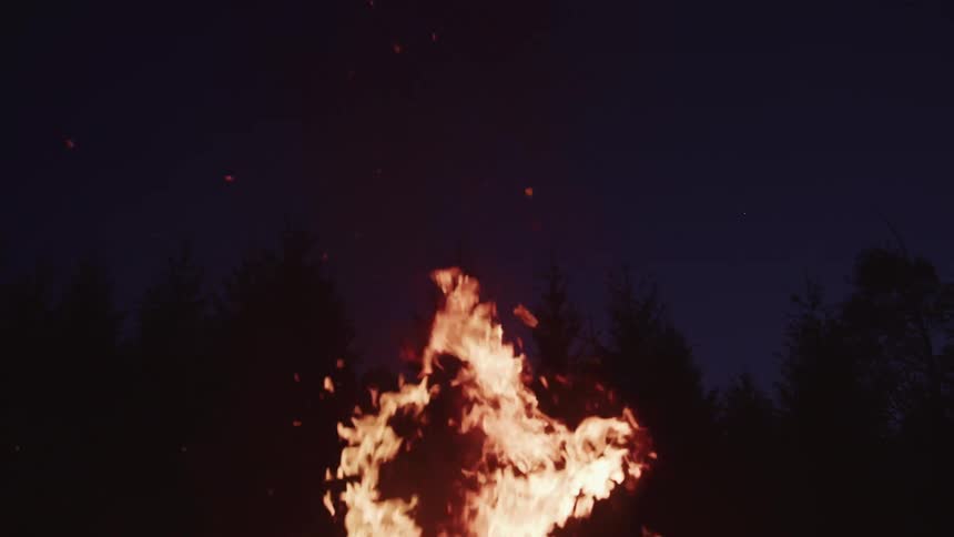 A bonfire burning at night