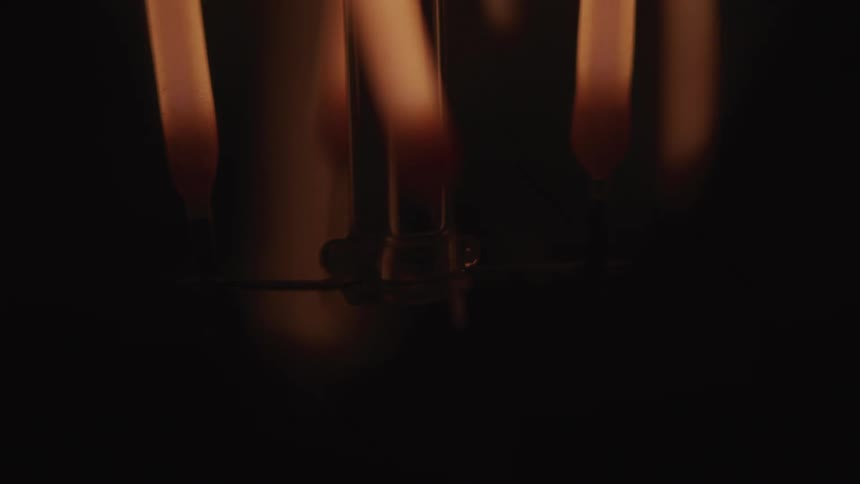 A light fixture turning on and off