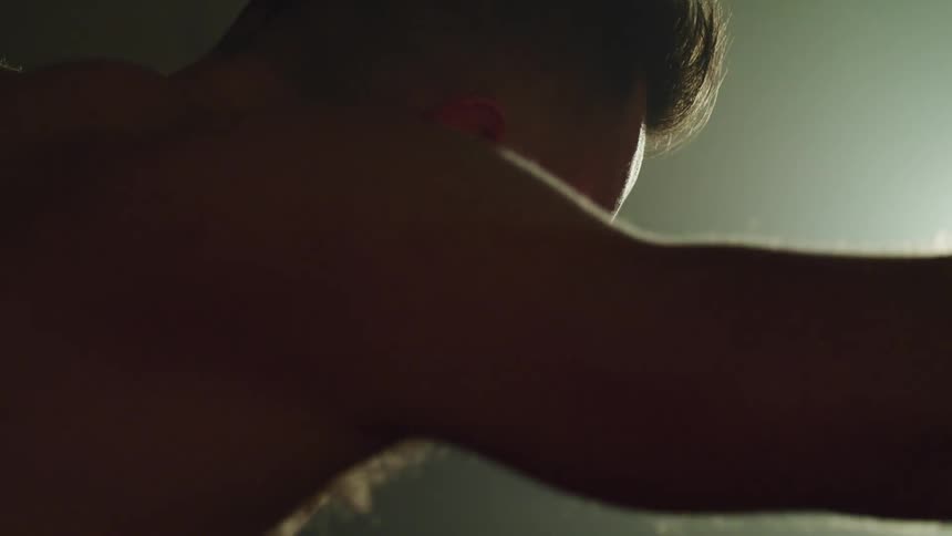A man exercising indoors