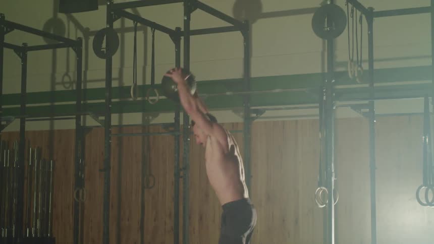 A man is working out in a gym