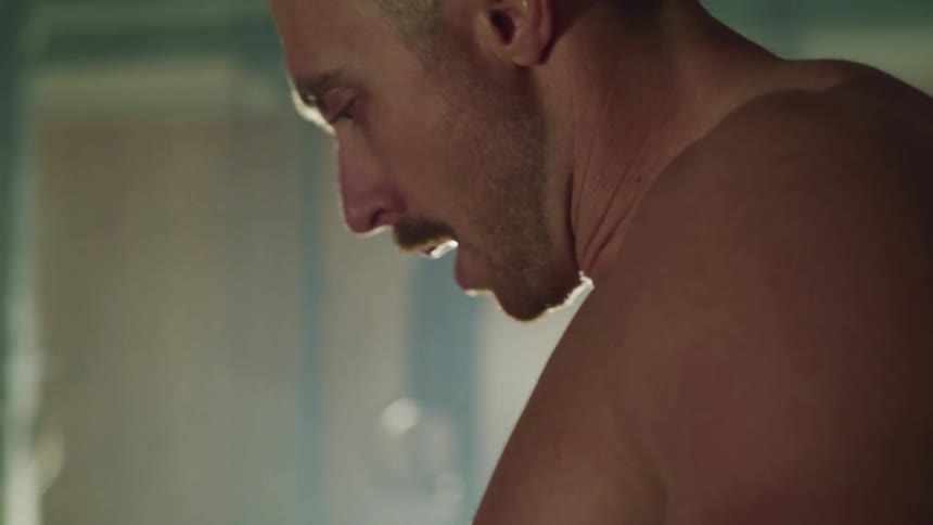 A man is working out in a room
