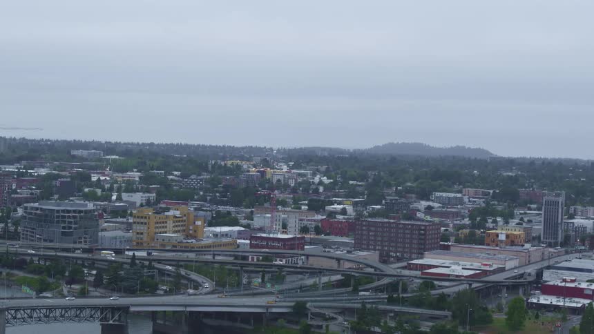 Vehicles travel on the roads by the city