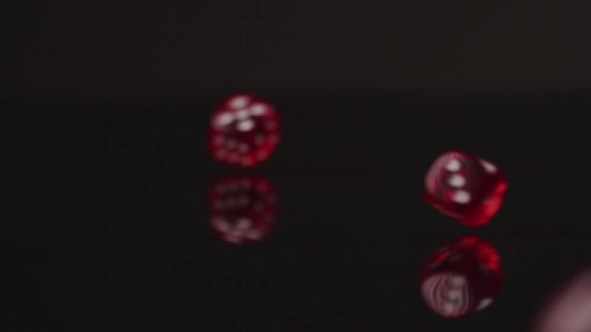 Dice rolling on a table