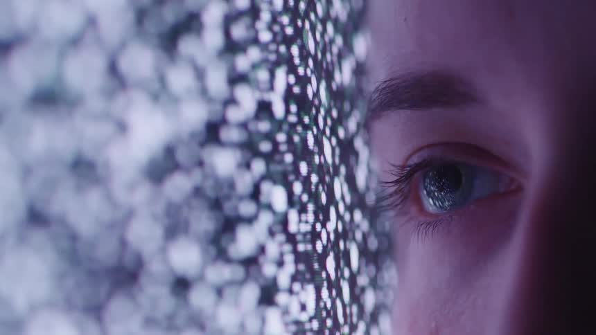 A persons face is leaning against the television screen