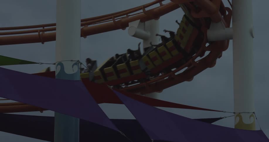 People riding a roller coaster