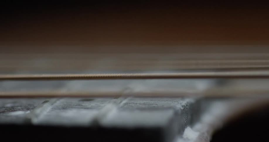 Guitar strings vibrate and shake