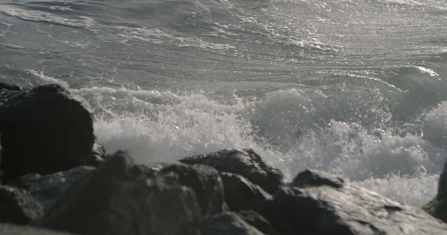 Waves crash on a rocky coast