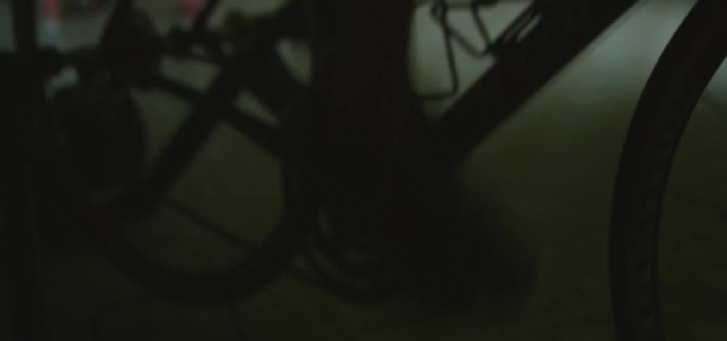 A person cycling on an exercise bike