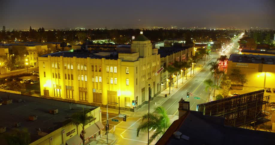 An aerial view of a downtown city is displayed