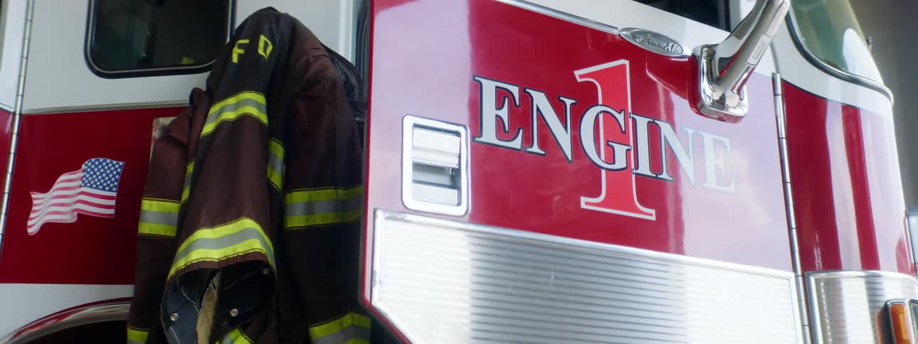 A fire truck parked in the station