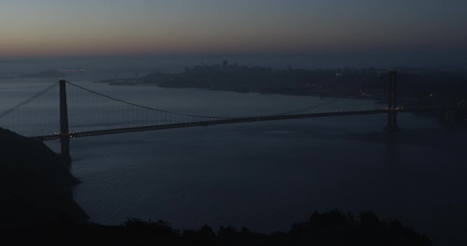 A bridge crosses a large body of water