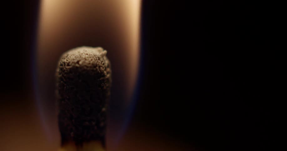 A match flaming and burning