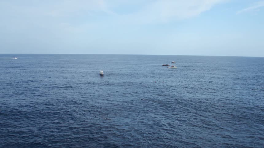 Boats are driving on the ocean water