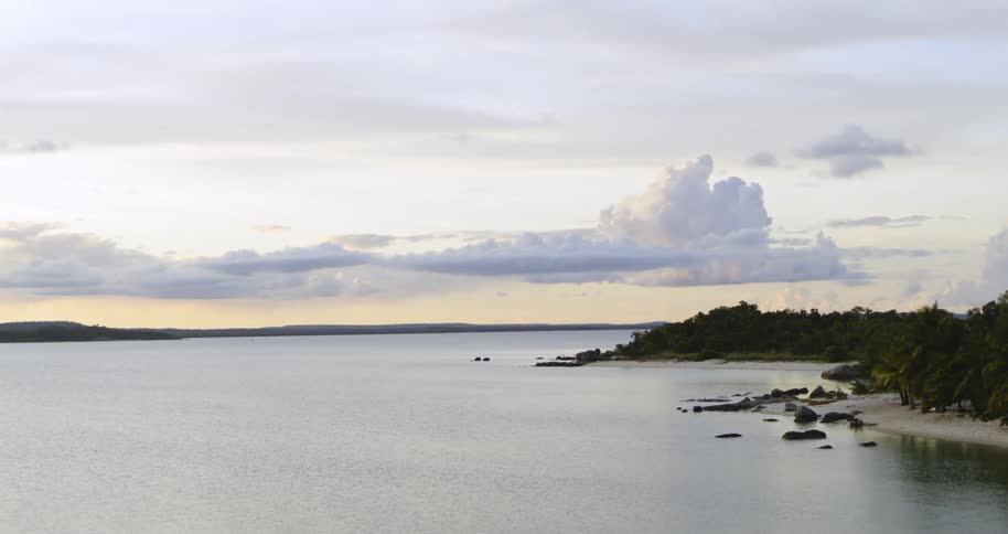A view of the ocean is displayed at dusk
