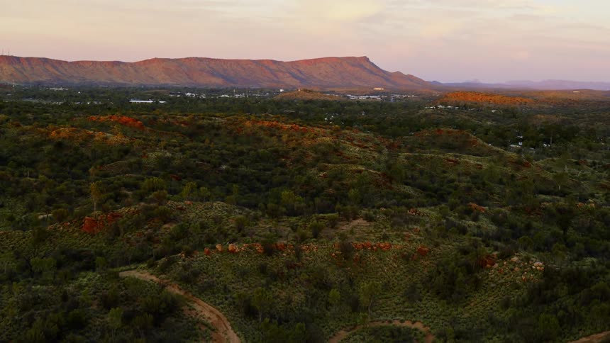 A vast hilly countryside laced with dirt roads
