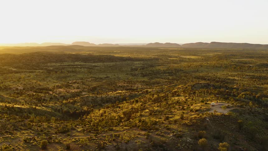 An aerial view of a landscape is displayed