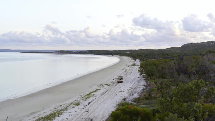 An aerial view of a sandy beach