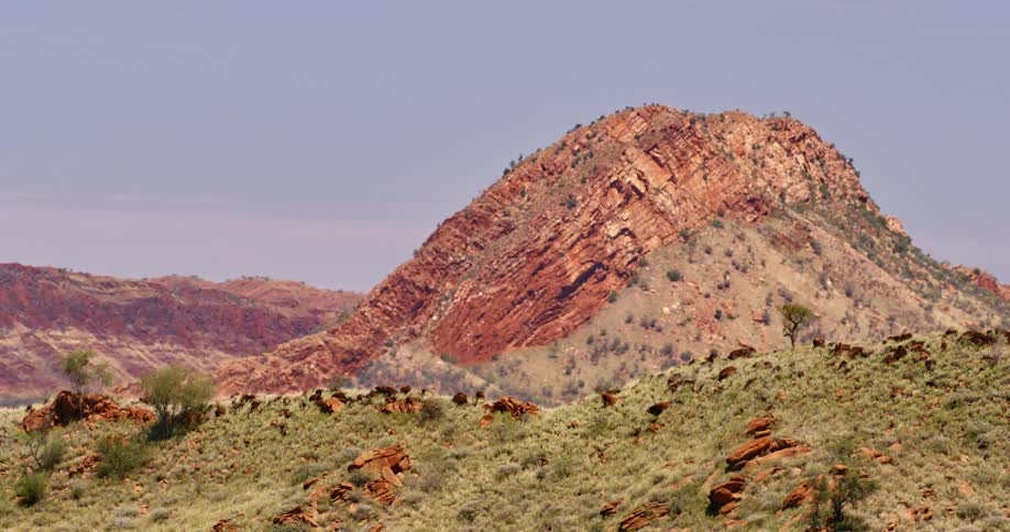 A rocky hill in a desert landscape